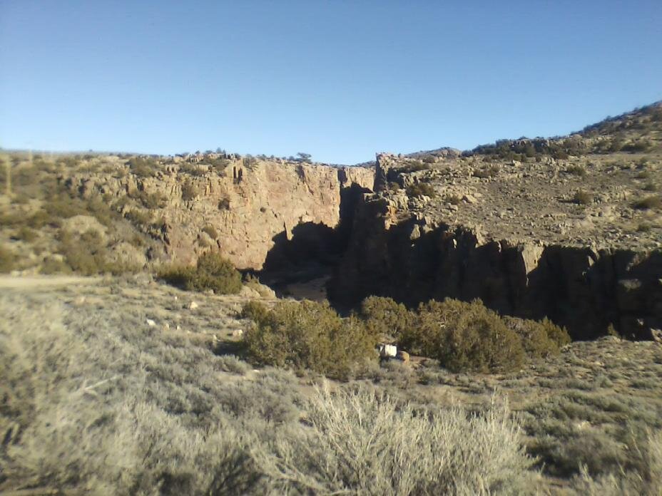 23- Sheer rock cliffs droping to river below- No way out of this canyon for anyone foolish enoug.jpg