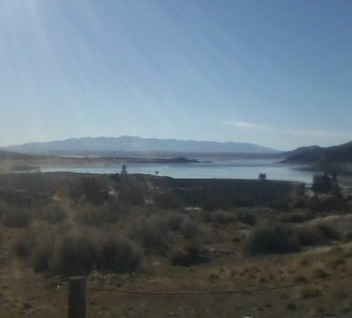 41- Pathfinder dam and resivour wit high mtns in the distance. this si high mountain dessert cou.jpg