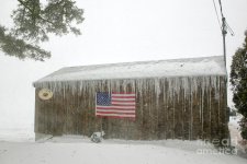 barn-with-american-flag-during-blizzard-of-05-on-cape-cod-matt-suess.jpeg