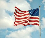 5066060-american-flag-waving-in-the-wind.jpg