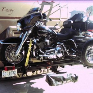 HD Street Glide with Voyager - electric winch raises behind my motorhome, my Saturn Vue tows behind that. Who says you can't take it with you!