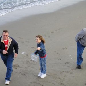 My son , granddaughter and me collecting shells on jensen beach.